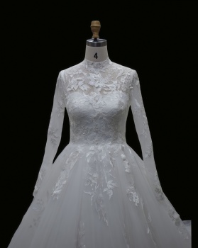 High-Neck Long Sleeve Lace Wedding Dress with Ethereal Illusion Details and Full A-Line Skirt
